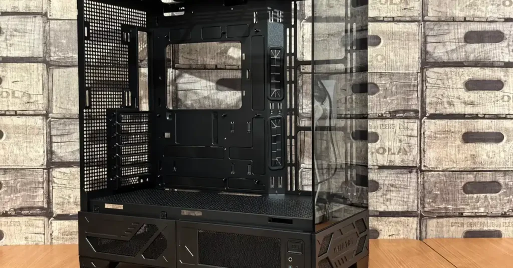 PC Case Sizes Explained: ATX vs Micro-ATX vs Mini-ITX Black tempered-glass PC tower case on a desk — PC case sizes explained